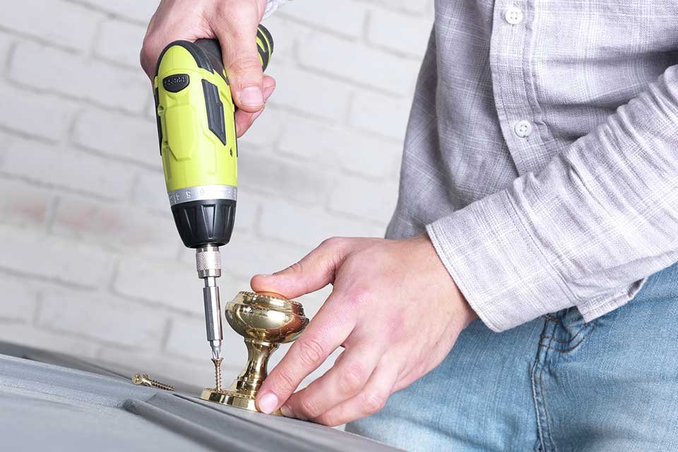 Screwdriver. Secure brackets in place.